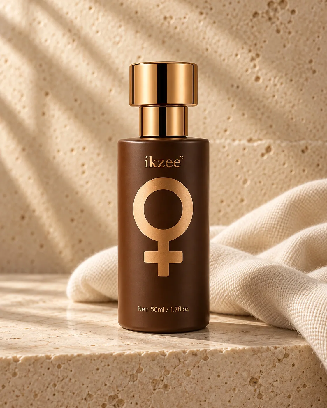 IKZEE No.02 Soft Aura bottle on warm travertine and ivory linen